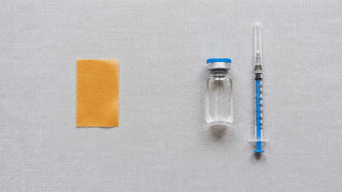Oral dissolving B12 strip next to a small vial and syringe, side by side comparison 